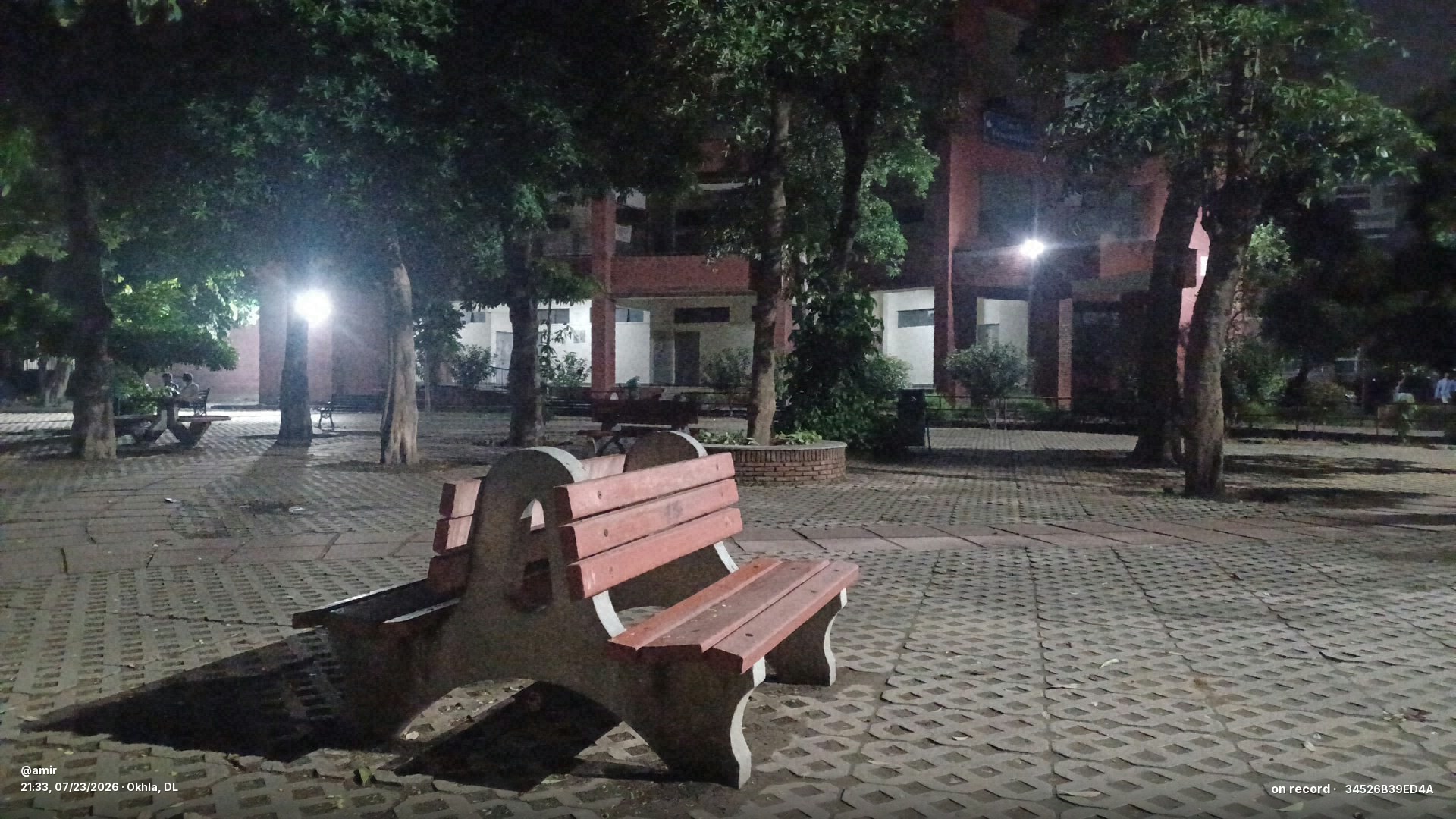 The campus feels different at night.
The silence s